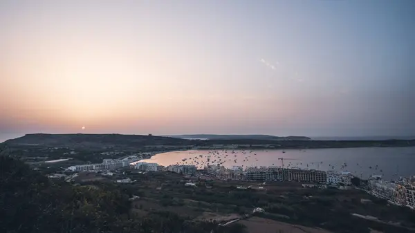 stock image Beautiful sunset landscape in Mellieha Bay with some boays in Malta Island, Mediterranean Sea