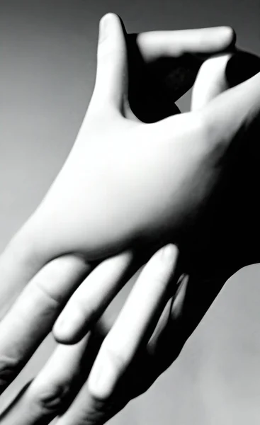 black and white photo of a female hand