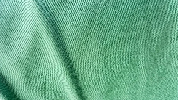 Uma Fotografia Uma Camisa Verde Com Uma Faixa Branca Tecido — Fotografia de Stock