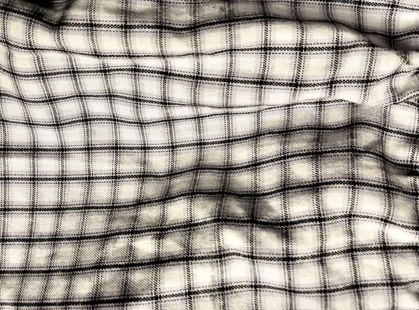 Una Fotografia Una Foto Bianco Nero Una Camicia Quadri Tenda — Foto Stock