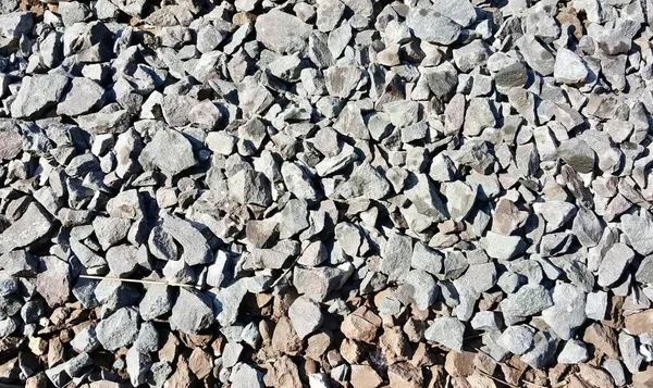 Una Fotografía Montón Rocas Grava Una Playa Pared Piedra Con — Foto de Stock