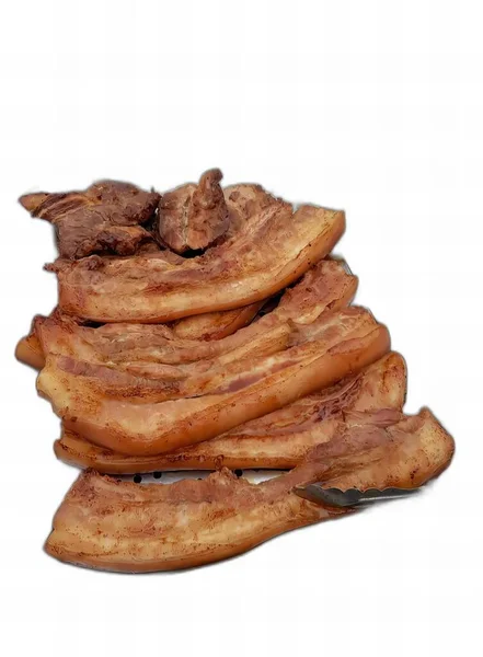Uma Fotografia Uma Pilha Tiras Bacon Uma Superfície Branca Loafs — Fotografia de Stock