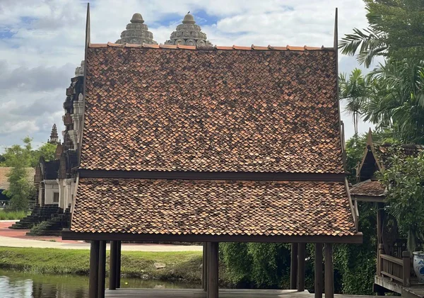 a wooden roof with a shingle roof.