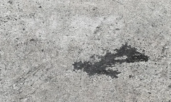 Ein Schwarzer Fleck Auf Dem Beton — Stockfoto
