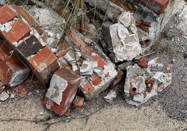 a pile of bricks and debris.