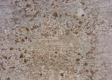 Kaba bir dokusu olan bir duvarın dokusu.