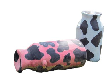 a photography of two painted vases with a cow pattern on them. clipart