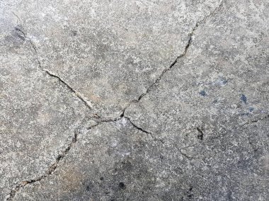 Betondaki çatlağın fotoğrafı zemindeki çatlağı gösteriyor..