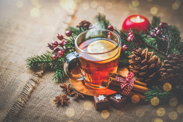 stock image Lemon tea in glass cup on christmas background