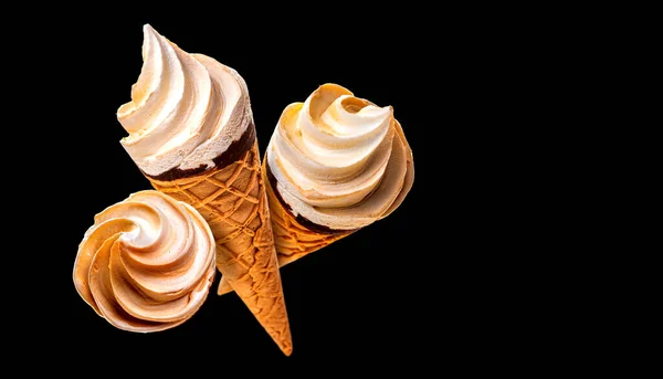 Three waffle cups with ice cream. Isolate on black background