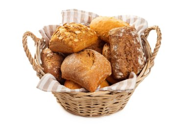 Basket with rolls from white and dark flour. Isolate on white background