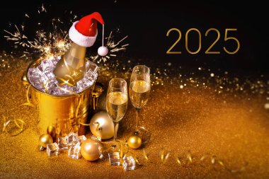 A bottle of champagne in a golden bucket with ice and two glasses on a black and gold background. clipart