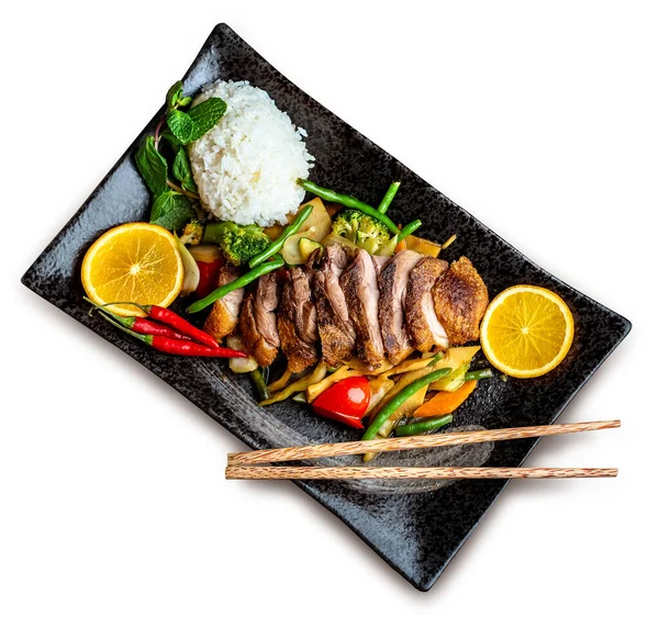 Asiatisches Essen Peking Ente Reis Und Gemüse Auf Einem Schwarzen Stockbild