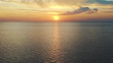 Aerial view of Sunset on the sea. High quality 4k footage