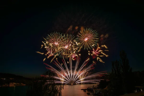 stock image fireworks over the water surface