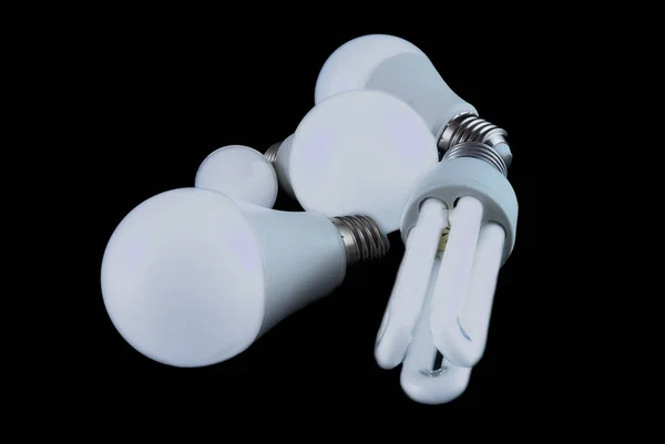 Energy Saving Light Bulbs Different Shapes Illuminated Black Background — Stock Photo, Image