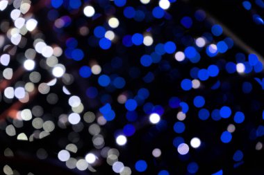 mavi ve beyaz ışık kabarcıkları, soyut arkaplan, bokeh bulanıklık efekti