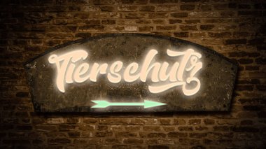 Almanca işaretli bir resim, hayvan refahını işaret ediyor..