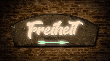 Resim Almanca 'da özgürlük yönünü gösteren bir tabela ve tabela gösteriyor..