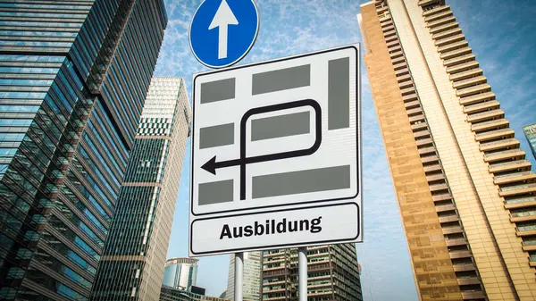 stock image Image shows a signpost and a sign in the direction of an education in German.