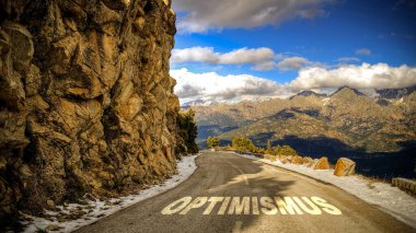 İyimserliği işaret eden Almanca bir tabela resmi.