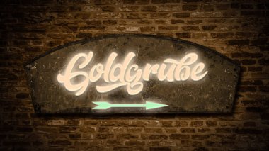 Resim bir tabela ve Alman madeninin yönünü gösteren bir tabela gösteriyor..