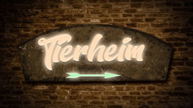 Almanca işaretli bir resim hayvan barınağının yönünü gösteriyor..