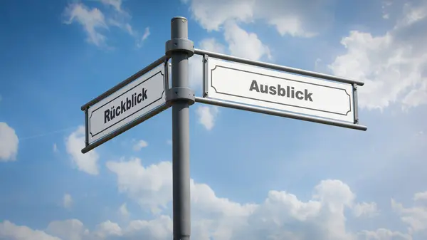 stock image An image with a signpost pointing in two different directions in German. One direction points to outlook, the other points to backsight