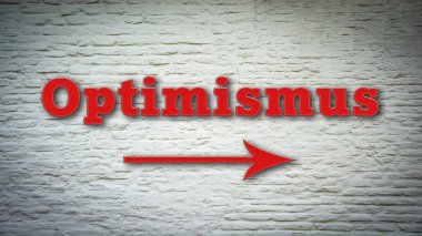 İyimserliği işaret eden Almanca bir tabela resmi.