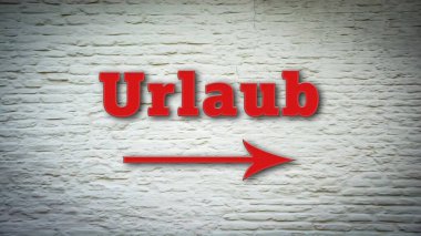 Tatil yönünü gösteren Almanca işaret levhası olan bir resim.