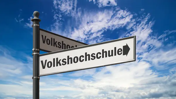 stock image An image with a signpost in German that points in the direction of the Community College.