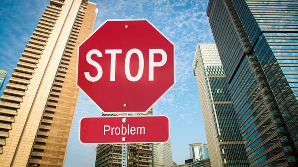 stock image An image with a signpost pointing in two different directions in German. One direction points to solution, the other points to problem.