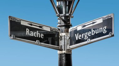 An image with a signpost pointing in two different directions in German. One direction points to forgiveness, the other points to revenge. clipart