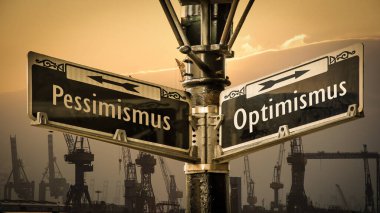 An image with a signpost pointing in two different directions in German. One direction points to optimism, the other points to pessimism. clipart