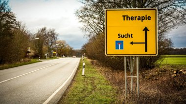 An image with a signpost pointing in two different directions in German. One direction points to addiction, the other points to therapy. clipart