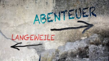 Görüntü, hayatın Almanca 'daki büyük macerasını gösteren bir tabela tasvir ediyor..