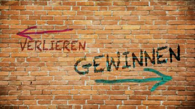 Almanca 'nın iki farklı yönünü gösteren işaret direği olan bir resim. Bir yön kazanır, diğeri kaybeder.
