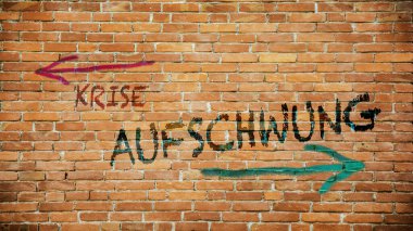 Almanca 'nın iki farklı yönünü gösteren işaret direği olan bir resim. Bir yön ters yöne, diğeri de krize işaret ediyor.
