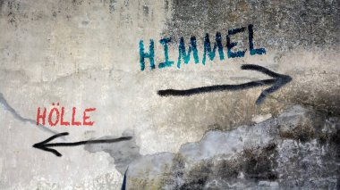 Almanca 'nın iki farklı yönünü gösteren işaret direği olan bir resim. Bir yön bugünü, diğeri de dünü gösteriyor..