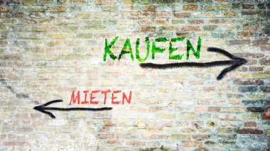 Almanca 'nın iki farklı yönünü gösteren işaret direği olan bir resim. Bir yön satın alınacak, diğeri kiralanacak..