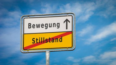 Almanca 'nın iki farklı yönünü gösteren işaret direği olan bir resim. Bir yön hareketi işaret eder, diğeri ise duraksamayı..