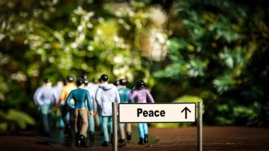 Barış için işaret eden bir işaret direği tasvir eden video