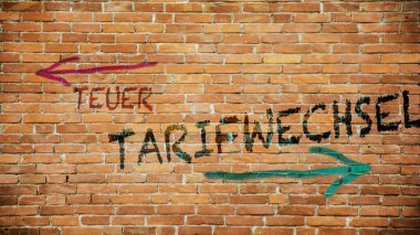 Almanca 'nın iki farklı yönünü gösteren işaret direği olan bir resim. Bir yön Gümrük Değişikliği, diğeri Pahalı.