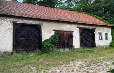 A street in a European town. An old brick building. Poland.