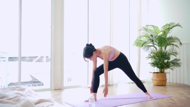 Young Smiling Attractive Sporty Asian Woman Practicing Yoga Doing Virabhadrasana — Video Stock