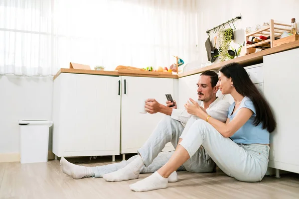 Happy Caucasian Couple Sitting Together Kitchen Floor Together While Man — Stock Photo, Image