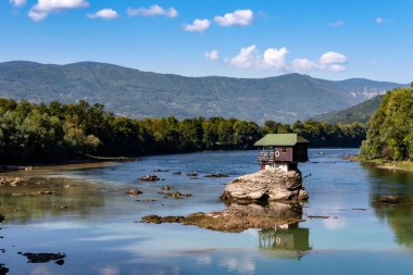 Famous small wooden house on a rock in the middle of river Drina in Bajina Basta, Serbia.