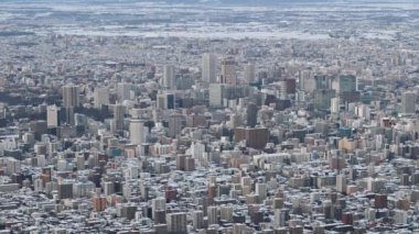 4K Gün ve gece şehir manzarası Sapporo kışın şehir merkezinde