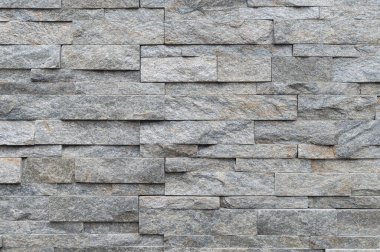 Gri tuğla duvar yüzeyinin dokusu