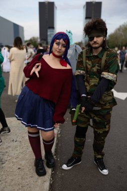 Bükreş, Romanya - 27 Nisan 2025: Doğu Avrupa Comic Con 'da Cosplayers. Çizgi roman, film, TV dizisi, bilim kurgu ve fantezi, oyun, Japon kültürü, Anime, Manga, tahta oyunları, kart oyunları ve son olarak da teknoloji oyunlarını seviyorlar..
